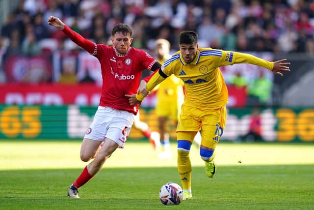 Bristol City's Max Bird (left) and Leeds United's Joel Piroe battle for the ball (Picture: Robbie Stephenson/PA Wire)