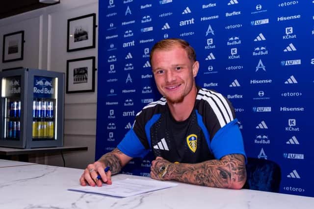 THE BARD OF BEESTON: Melvin Bard signs on the dotted line (Image courtesy of Leeds United)