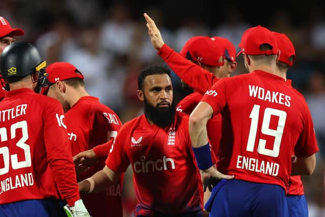 TON UP: England's Adil Rashid (C) celebrates with team-mates after getting the wicket of West Indies' Shimron Hetmyer at the Kensington Oval in Barbados in Tuesday's opening T20 international - giving him his 100th wicket in the format. Picture: Ashley Allen/Getty Images