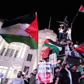 People take part in a Palestine Solidarity Campaign demonstration in Piccadilly Circus, London. PIC: Jordan Pettitt/PA Wire