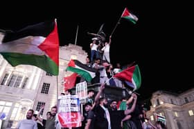 People take part in a Palestine Solidarity Campaign demonstration in Piccadilly Circus, London. PIC: Jordan Pettitt/PA Wire