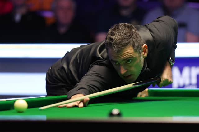 Genius: Left or right-handed, it's all the same to O'Sullivan. Photo by George Wood/Getty Images.