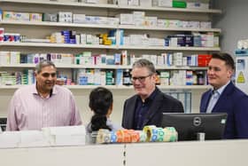 Prime Minister Sir Keir Starmer (centre) and Health Secretary Wes Streeting (second from right) during a visit to a health centre. PIC: Adrian Dennis/PA Wire