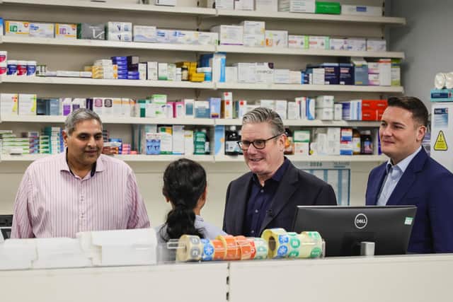 Prime Minister Sir Keir Starmer (centre) and Health Secretary Wes Streeting (second from right) during a visit to a health centre. PIC: Adrian Dennis/PA Wire