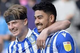 Former Sheffield Wednesday midfielder Massimo Luongo, pictured with former team-mate George Byers. Picture: Steve Ellis.