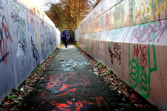 EMBARGOED TO 0001 FRIDAY FEBRUARY 17

File photo dated 22/12/2006 of graffiti daubed on 'Monkey Bridge' at Mere Green, Sutton Coldfield, in the West Midlands. Anti-social offenders would be forced to clear up litter and vandalism as part of "clean-up squads", under new Labour proposals. Issue date: Friday February 17, 2023. PA Photo. Labour's shadow justice secretary Steve Reed will use a speech on Friday to condemn the "scourge" of anti-social behaviour, warning that offenders need to face "consequences". The party is promising "clean-up squads" to tackle fly-tipping, which would see offenders tasked with clearing up dumped litter while also being hit with fixed penalty cleaning notices. See PA story POLITICS Labour AntiSocial. Photo credit should read: David Jones/PA Wire 