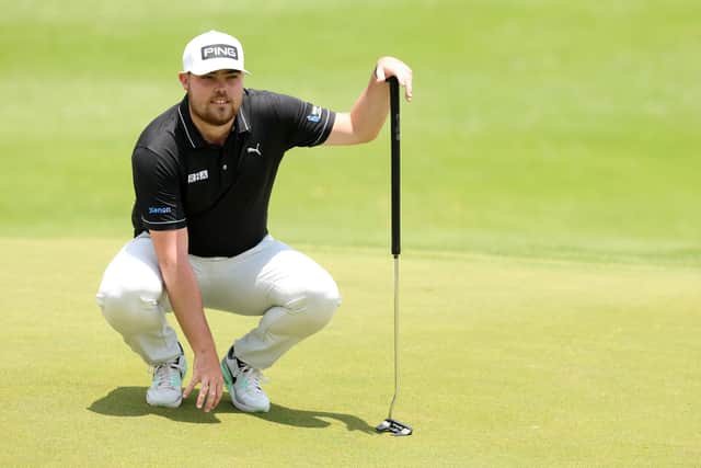 Dan Bradbury of England lines up a putt on the 18th green during Day Two of the Joburg Open at Houghton GC on November 25, 2022 in Johannesburg, South Africa. (Picture: Luke Walker/Getty Images)