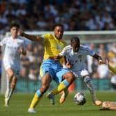 DEFENSIVE BATTLE: Akin Famewo and Barry Bannan get tight to Leeds United's Crysencio Summerville