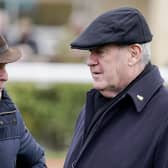 Treble up: Trainer Jonjo O'Neill, left, with JP McManus, the owner of Hasthing whose victory was part of a treble for the Irish trainer at Catterick yesterday. O'Neill's Track and Trace won the feature Vickers.Bet North Yorkshire Grand National. (Photo by Alan Crowhurst/Getty Images)