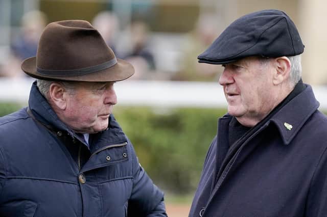 Treble up: Trainer Jonjo O'Neill, left, with JP McManus, the owner of Hasthing whose victory was part of a treble for the Irish trainer at Catterick yesterday. O'Neill's Track and Trace won the feature Vickers.Bet North Yorkshire Grand National. (Photo by Alan Crowhurst/Getty Images)