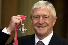 File photo dated 24/11/2000 of television chat show host Michael Parkinson who was awarded a CBE at Buckingham Palace in London, as he has died at the age of 88. Issue date: Thursday August 17, 2023. Kirsty Wigglesworth/PA Wire