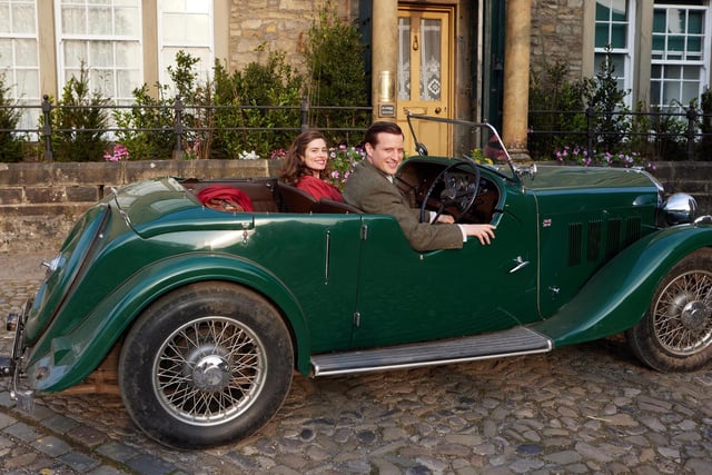 James and Helen drive off in style. Let's hope they look after that car.