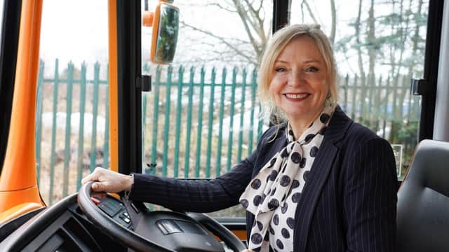 Mayor of West Yorkshire Tracy Brabin behind the wheel of a bus.