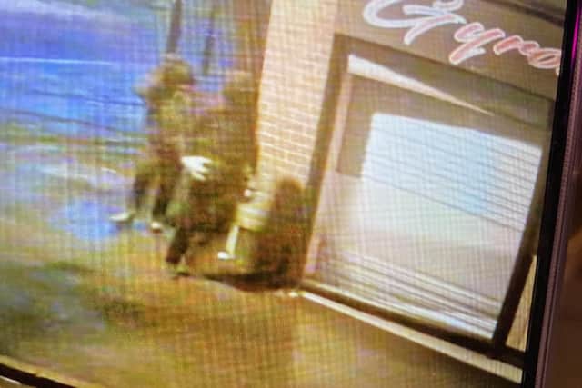 CCTV shows the burglars smashing their way into the restaurant