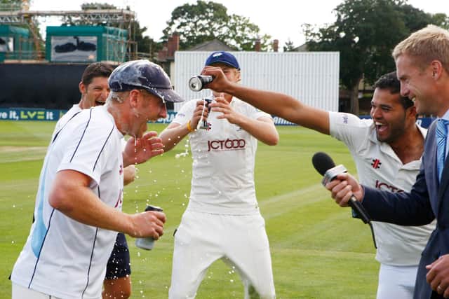 Azeem Rafiq drenches Andrew Gale with beer after Yorkshire clinched promotion back to Division One of the County Championship at Chelmsford in 2012. Gale was among those who lost his job due to Rafiq's allegations, as was the former director of cricket Martyn Moxon, who is standing to Gale's left. Also pictured are Joe Root, his face obscured as he enters into the spirit of the occasion, and the Sky Sports presenter and former Kent captain David Fulton. Picture by Keiran Galvin/SWPix.com