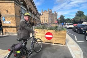 Liberal Democrat Coun Andrew Waller at the planter in the cycle lane at York Station. Picture is from York Liberal Democrats
