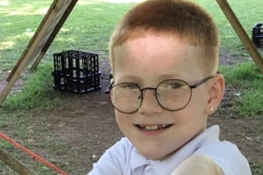 Joshua Slater, eight, in a photo released by his school