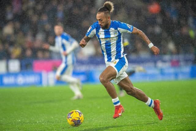 BIG DECISION: Last January Huddersfield Town coach Mark Fotheringham decided to loan out Sorba Thomas but a couple of weeks later his replacement Neil Warnock was saying he would rather have kept the winger