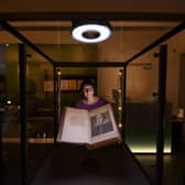 Rhiannon Lawrence-Francis, Special Collections Curator pictured with a book from the Shakespeare First Folios at the Treasures Gallery at Leeds University, Leeds. Picture taken by Yorkshire Post Photographer Simon Hulme 18th April 2023










