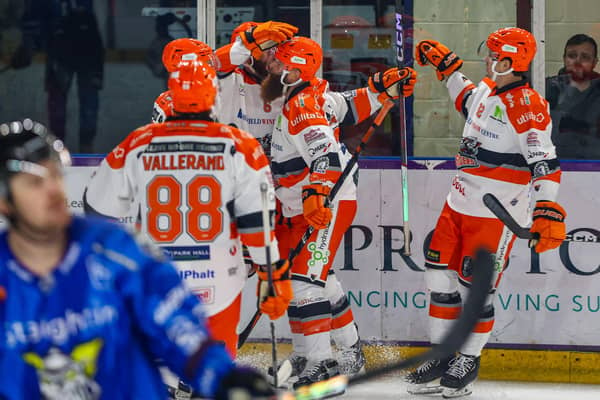 ON OUR WAY: Sheffield Steelers' players celebrate Kevin Tansey's opening strike at Manchester on Saturday night. Picture: Mark Ferriss/EIHL Media.