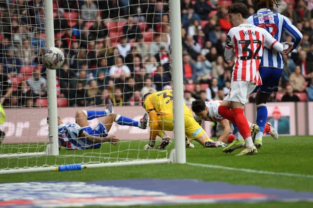 BIG GOAL: Liam Palmer puts Sheffield Wednesday in front at Sunderland
