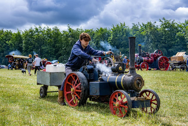 Freddie Kirk from Aldbrough near Hull tours the festival aboard a 4 inch scale Burrell miniature engine.