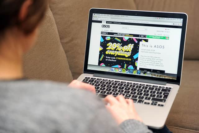 Online fashion firm Asos has revealed sliding sales in its festive quarter as it took a hit from delivery disruption and slumping consumer spending