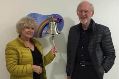 Trevor and Judy ringing the end-of-treatment bell in the Bexley Wing, St James's University Hospital. Image: Judy Hatton