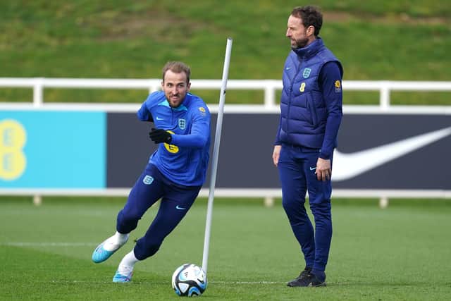FAMILIAR FACES: England manager Gareth Southgate watches on as captain and forward Harry Kane (left) is put through his paces in Wednesday's training session at St. George's Park, Burton upon Trent. Picture: Mike Egerton/PA
