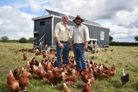 Charles and James Johnson with their pasture-grazed hens at Mallard Grange Farm, near Ripon.