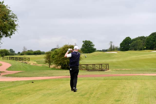 Golfers playing the new course at Aldwark Manor
