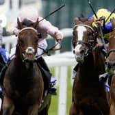 Fast finisher: William Buick riding Notable Speech, right, comes home powerfully to win the Group One Boyle Sports Lockinge Stakes at Newbury on Saturday.