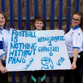 Fans of Sheffield Wednesday pose with a banner reading 'Football is nothing without fans, Wednesdayites 1, Chansiri 0' prior to the Sky Bet Championship match between Sheffield Wednesday and Oxford United at Hillsborough on October 25, 2025 (Picture: Cameron Smith/Getty Images)