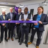 First patient Russell Dickens cuts the ribbon to the new facility (3rd from left) with Consultant Clinical Scientist Anna Hallam, Sheffield Teaching Hospitals Chief Executive Kirsten Major, Consultant Clinical Oncologist Professor Jonathan Wadsley, South Yorkshire’s Mayor Oliver Coppard, Uriah Rennie and Technical Manager Adam Pickles.