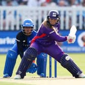 Bess Heath of Northern Superchargers plays a reverse sweep as Richa Ghosh of London Spirit looks on during The Hundred (Picture: Clive Rose/Getty Images)