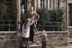 Waving them off: Anna Madeley (Mrs Hall) Samuel West (Siegfried Farnon) Callum Woodhouse (Tristan Farnon) Isabella Ward (Rosie Herriot) ©5 Broadcasting Limited / © Playground Television UK Ltd. 2026 / Photographer: Helen Williams