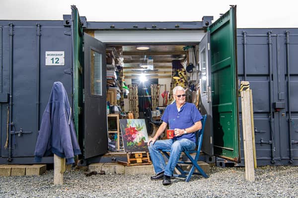 Roy Johansen painting wildlife pictures in his studio, a storage container at Waxholme near Withernsea in the East Riding of Yorkshire. PIcture by Tony Johnson.