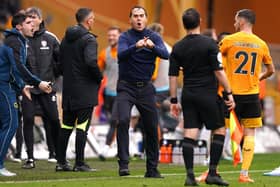 UNHAPPY: Wolverhampton Wanderers coach Julen Lopetegui (centre left)