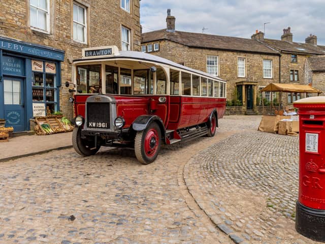 Tom Holmes Photography 2024 All Locations Great and Small Calendar - Bus To Brawton  - in Grassington dressed as Darrowby for the filming of All Creatures Great and Small