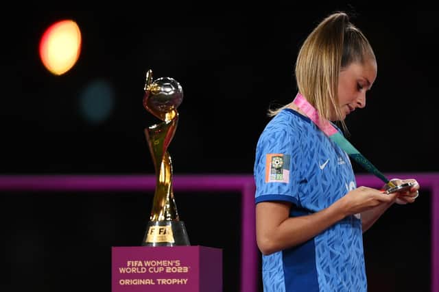 Ella Toone of England looks dejected after the team's defeat as she walks past the FIFA Women's World Cup Trophy after the FIFA Women's World Cup Australia & New Zealand 2023 Final match between Spain and England at Stadium Australia on August 20, 2023 in Sydney, Australia. (Picture: Justin Setterfield/Getty Images)