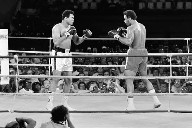In this photo taken on October 30, 1974 shows the fight between US boxing heavyweight champions, Muhammad Ali (L) (born Cassius Clay) and George Foreman in Kinshasa. (Photo by STR/AFP via Getty Images)