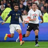 BIG STAGE: Defender Max Wober battles with France's Jonathan Clauss during a UEFA Nations League clash at the Stade de France in September last year. Picture: ANNE-CHRISTINE POUJOULAT/AFP via Getty Images