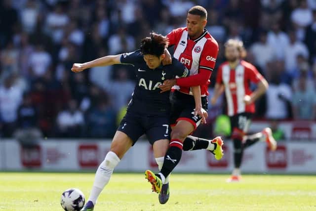 BOOED ON: Vinicius Souza, pictured tangling with Son Heung-Min of Tottenham Hotspur