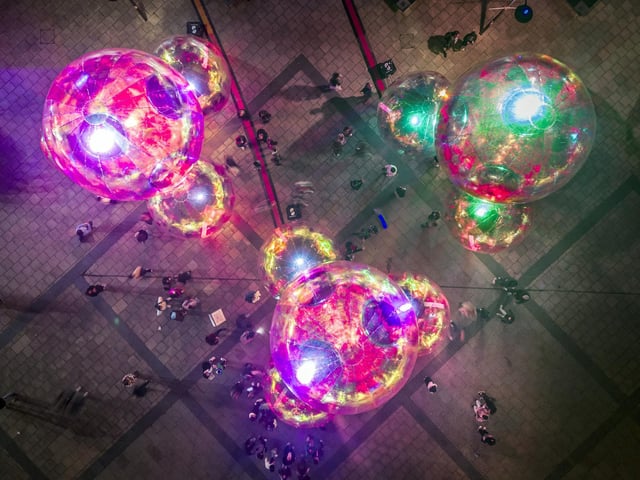 People view light installation Evanescent by artist Atelier Sisu, part of Light Night Leeds, the UK's largest annual arts and light festival. Photo credit: Danny Lawson/PA Wire