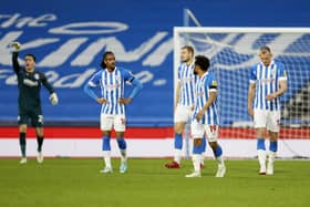 Huddersfield Town players show their dejection after conceding a late goal during the Sky Bet Championship match at the John Smith's Stadium, Huddersfield. Picture: Richard Sellers/PA