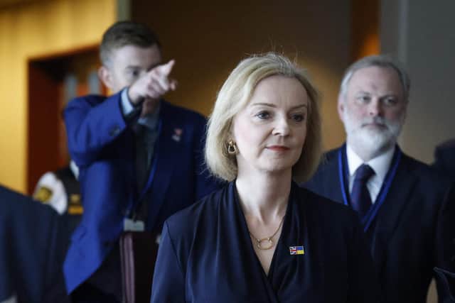 British Prime Minister Liz Truss walks through the United Nations headquarters in New York City on September 20, 2022. (Photo by Ludovic MARIN / AFP) (Photo by LUDOVIC MARIN/AFP via Getty Images)