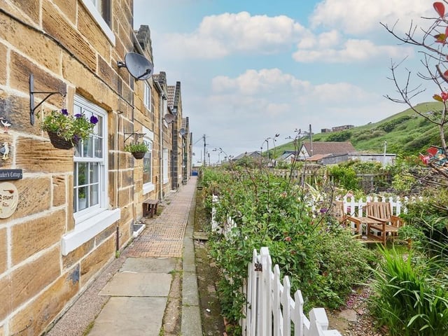 This property is on a row of beautiful period cottages