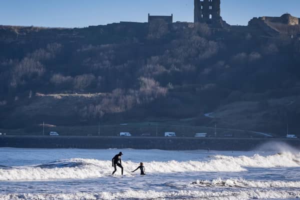 Surfers in North Bay Scarborough Picture by Marisa Cashill
