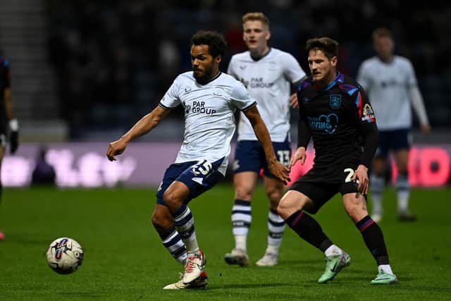 Duane Holmes of Preston holds off Ben Wiles of Huddersfield (Picture: Gareth Copley/Getty Images)