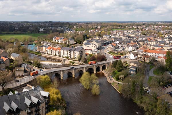 An aerial landscape of the West Yorkshire town of Wetherby with road bridge and weir over the river Wharfe
